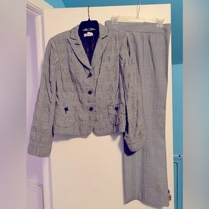 This popcorn blazer and pants in black Herringbone suit